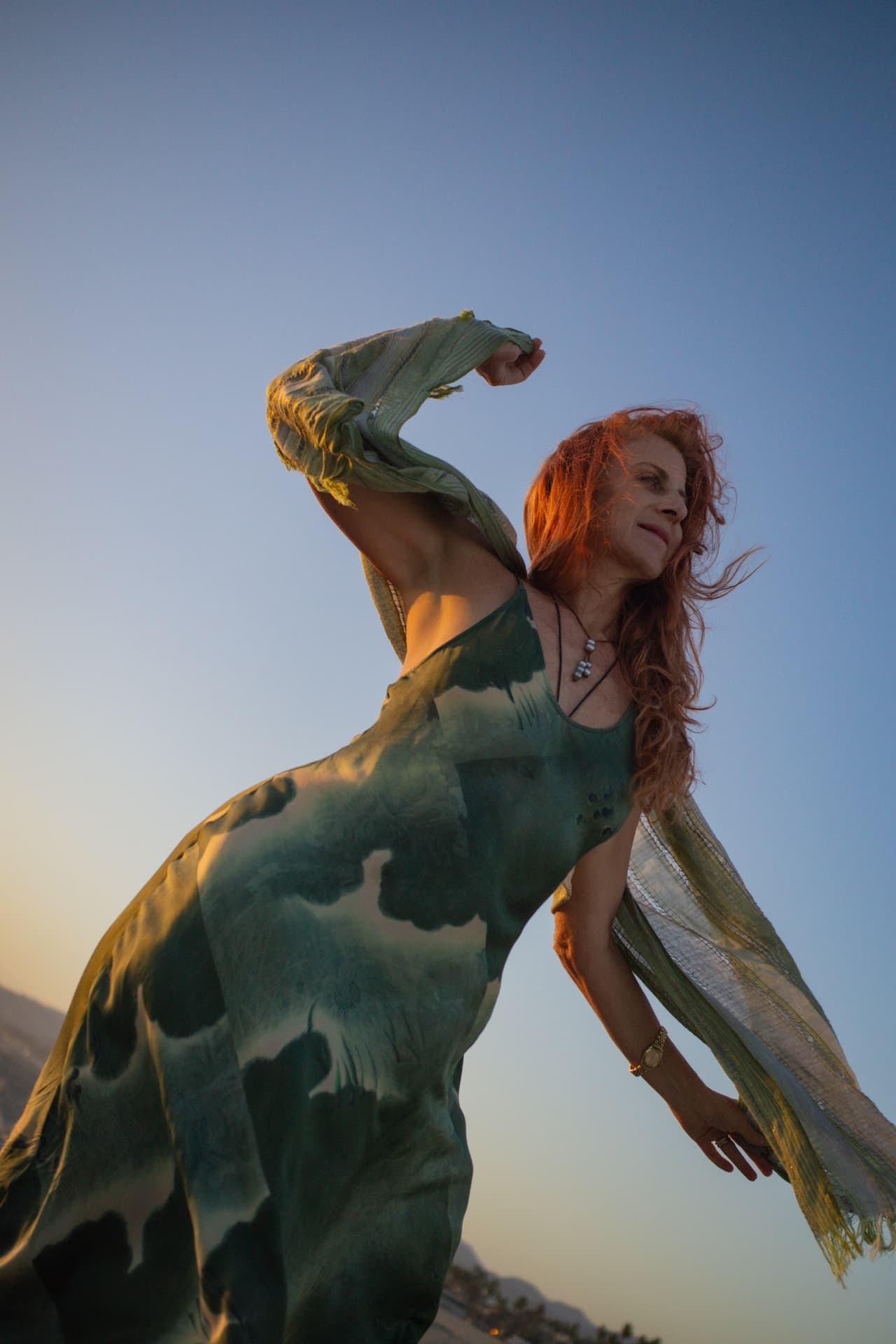 Alix Gucovsky moving outdoors in warm evening light